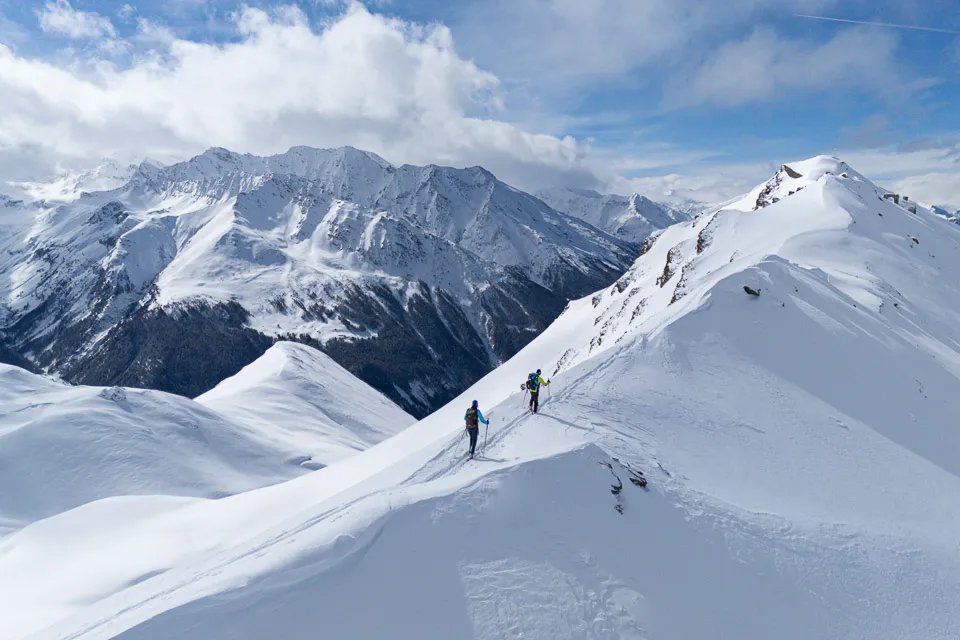 Ski tourers going off-piste in Val Cenis